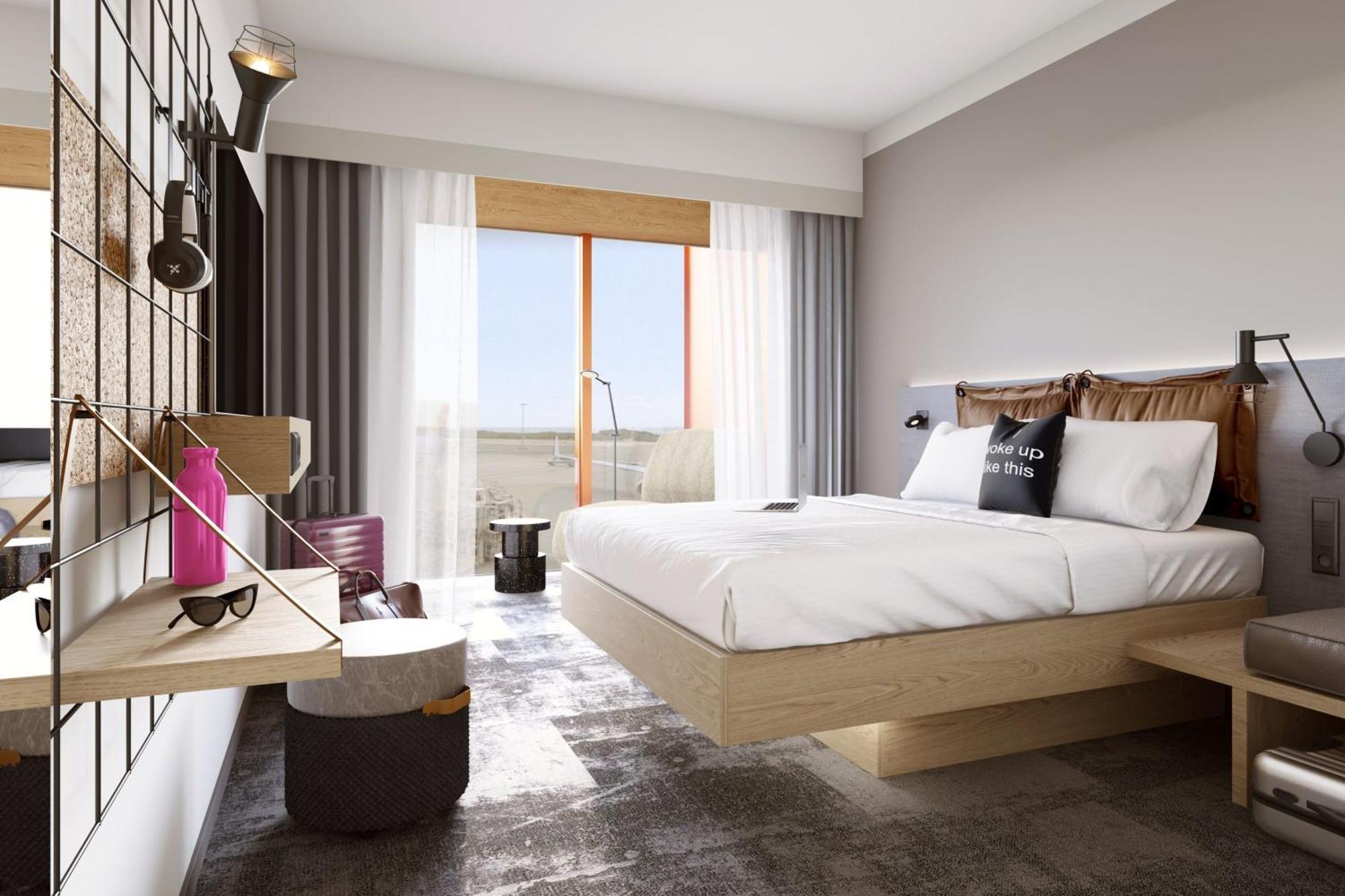 Hotel Moxy Luxembourg Airport à Niederanven Extérieur photo